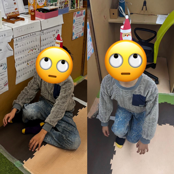 頭に紙コップを乗せたまま立ち上がることに挑戦する児童