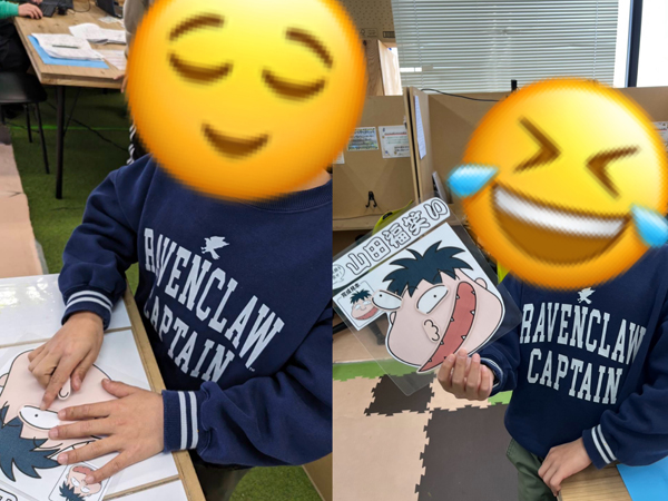 放課後等デイサービスで福笑いで遊ぶ児童